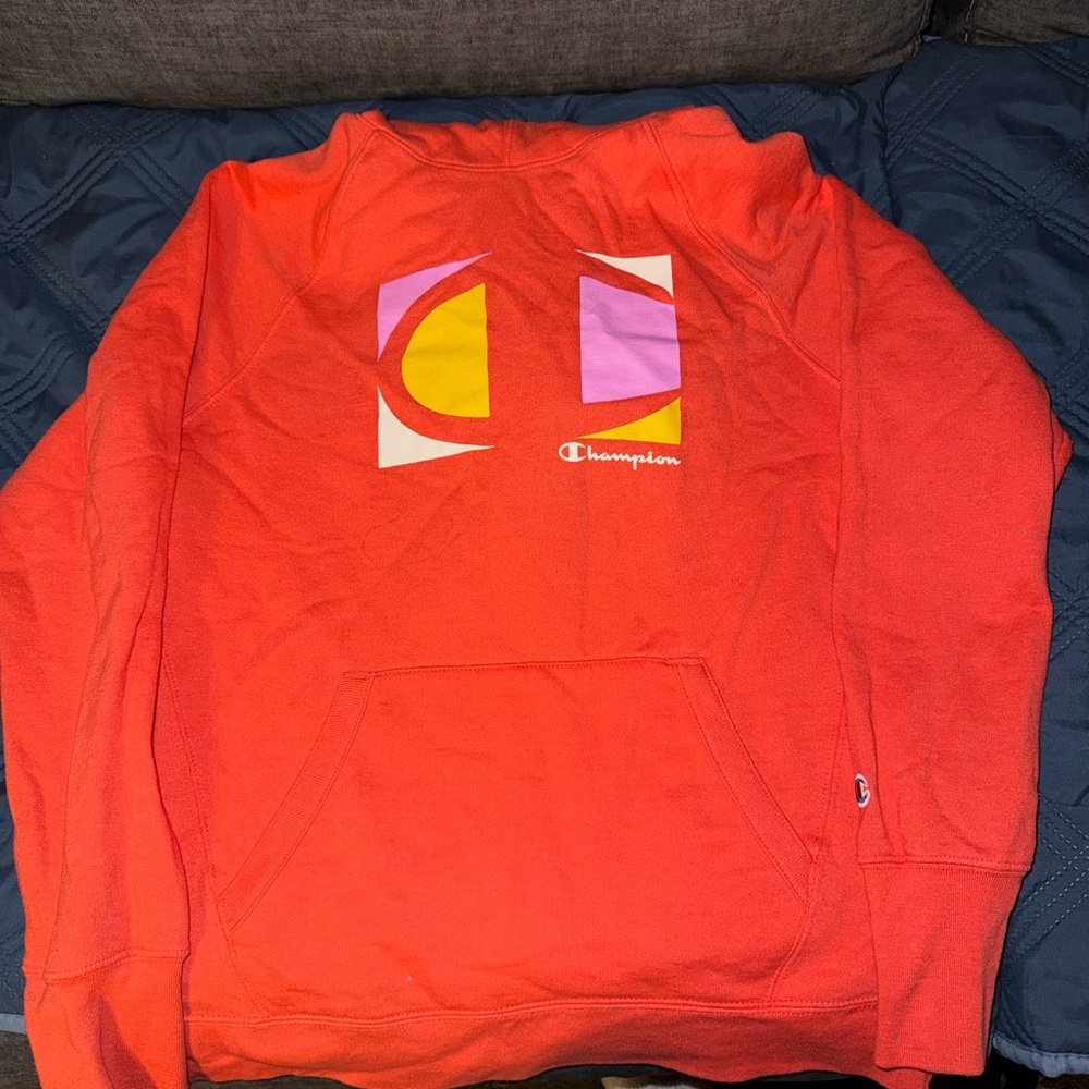 Champion Vibrant Orange Hoodie with Abstract Design